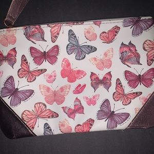 A butterfly designed clutch